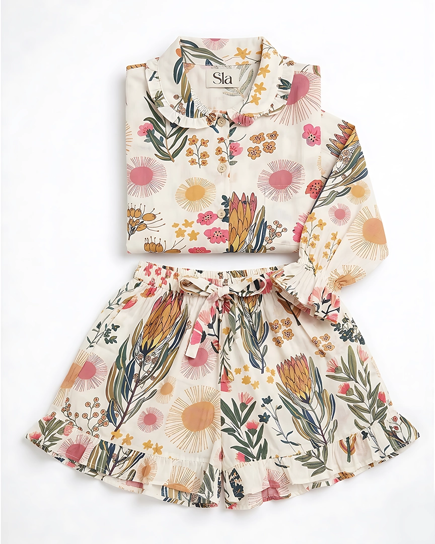 PJS-4a Desert Bloom Ruffled Shortie Pajama Set – Cream with Protea & Sunbursts